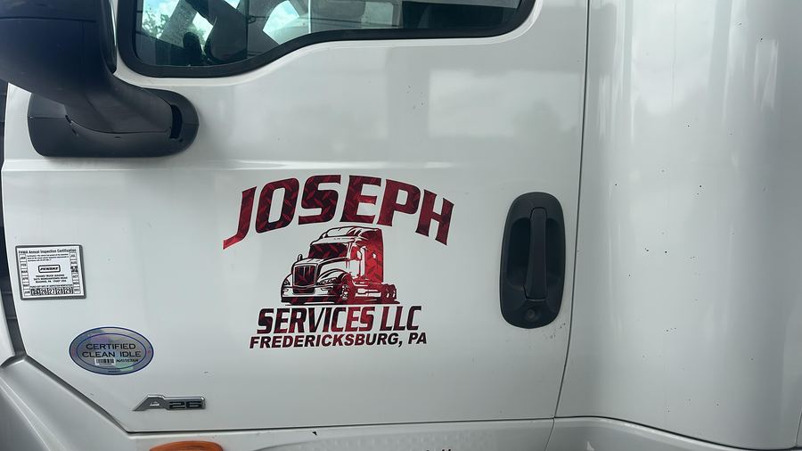The Joseph Services LLC decal on the door of truck 01, Fredericksburg PA