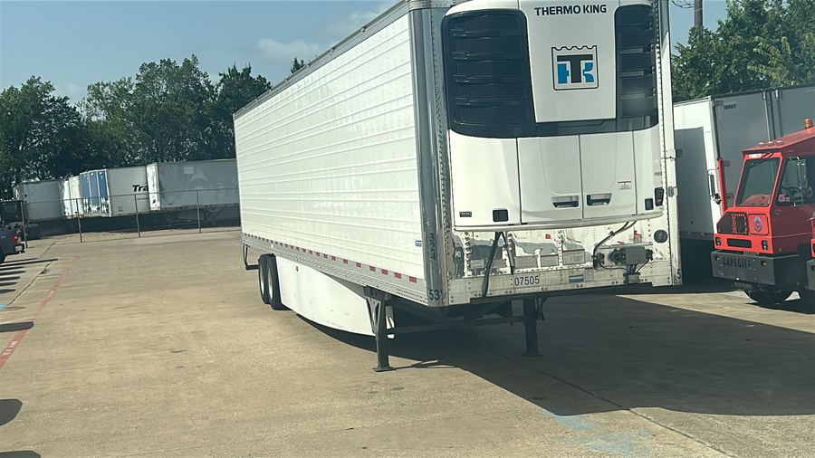A Thermo King refrigerated trailer standing in the yard