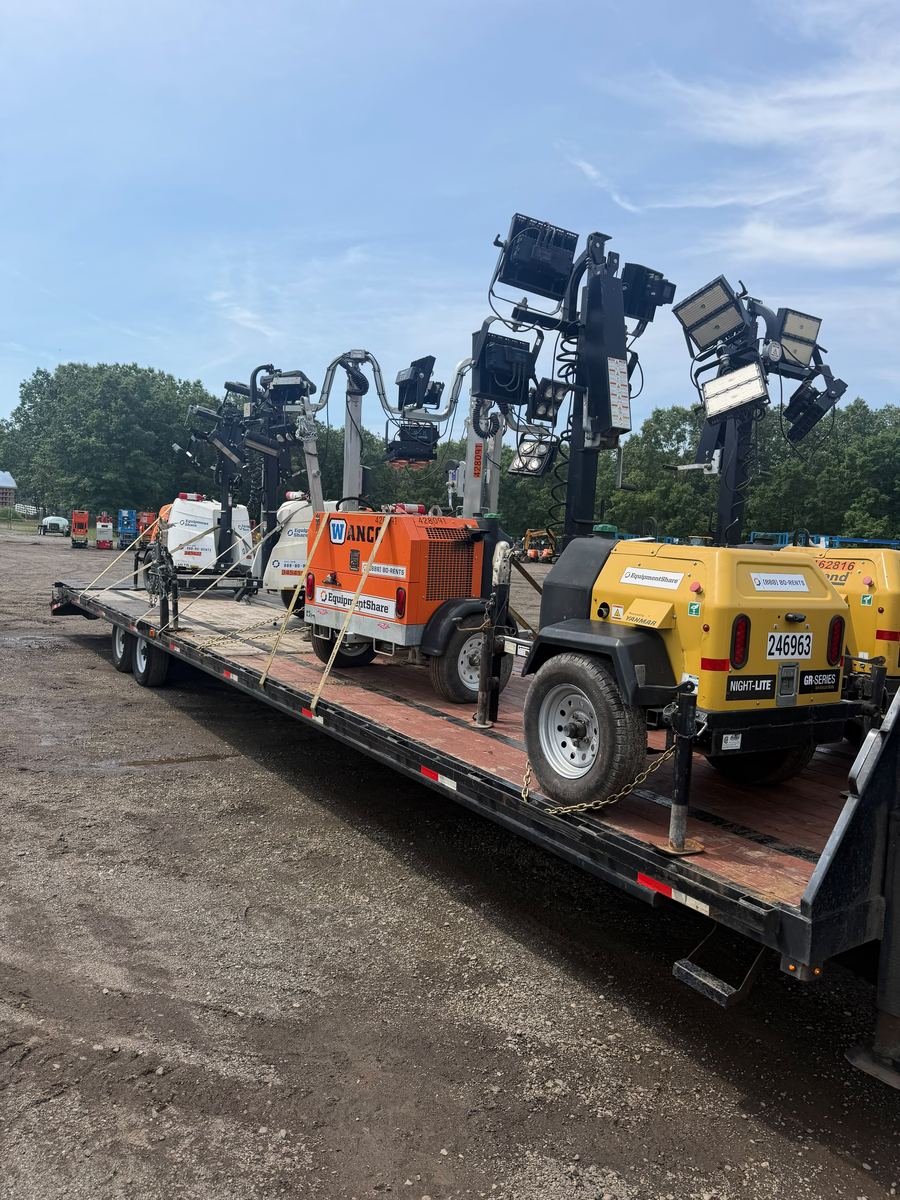 Portable light towers loaded together on one of our flatbeds